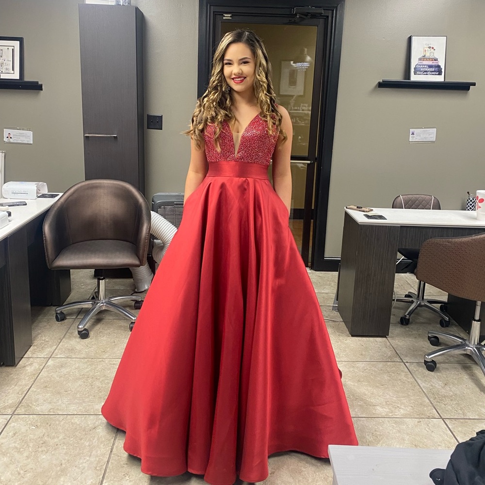Formal floor length prom or pageant dress with pockets.